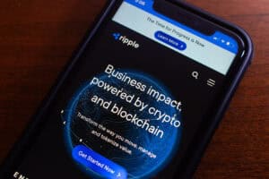 Website of Ripple seen in an iPhone screen.