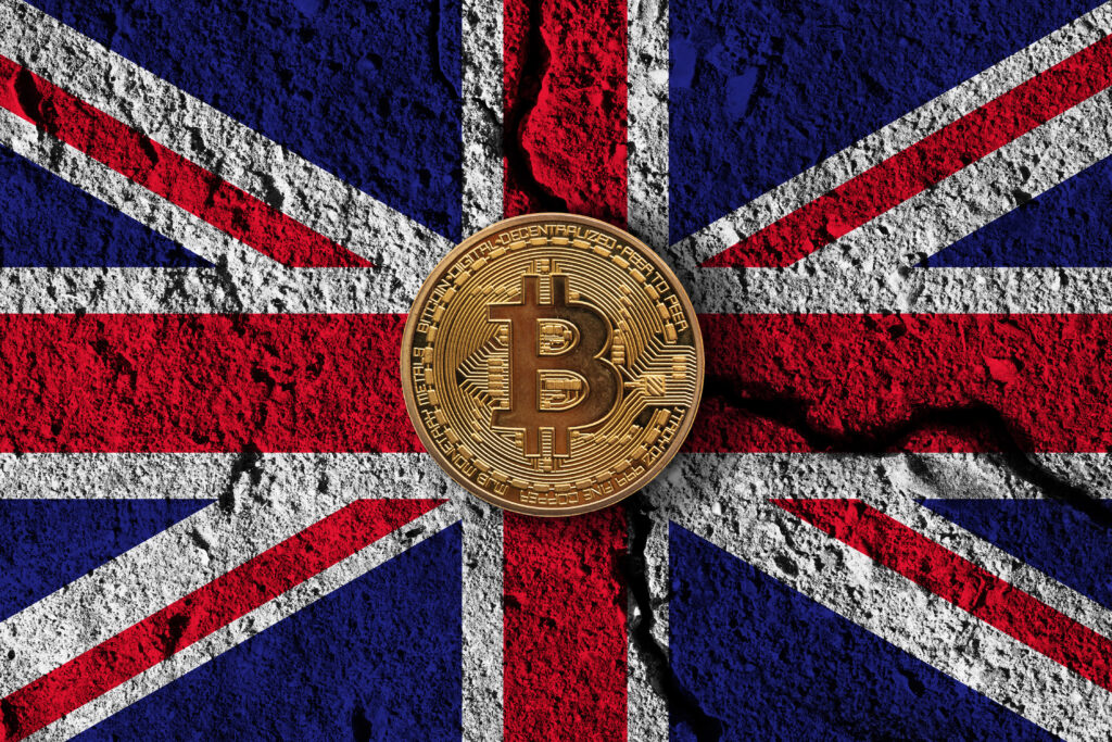 Bitcoin crypto currency coin with cracked UK flag.