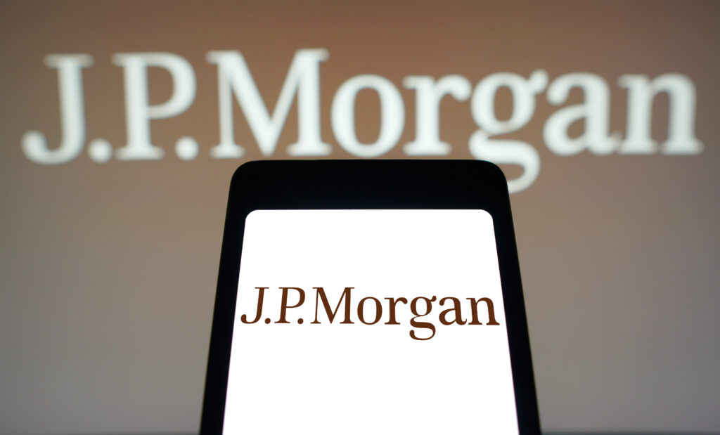 JPMorgan logo is displayed on a smartphone screen and in the background