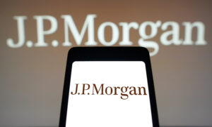 JPMorgan logo is displayed on a smartphone screen and in the background