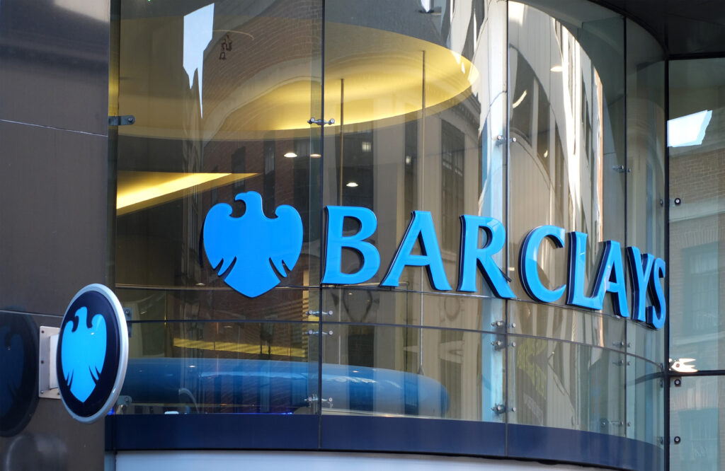 sign and logo on the window of a branch or Barclays bank on albion street in leeds city centre