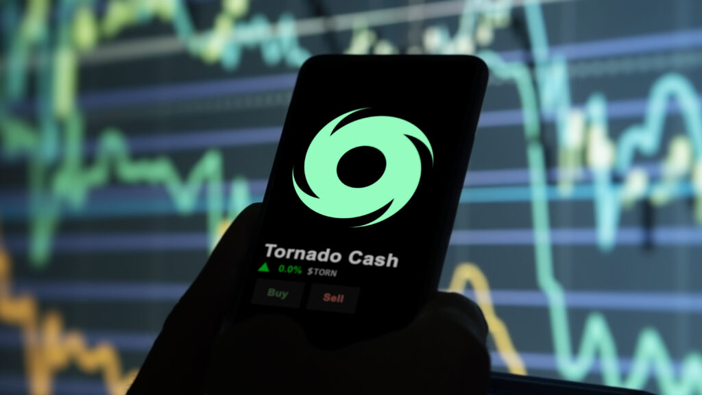 An investor analyzing the price of Tornado Cash, the token coin $TORN on a crypto exchange sreen.