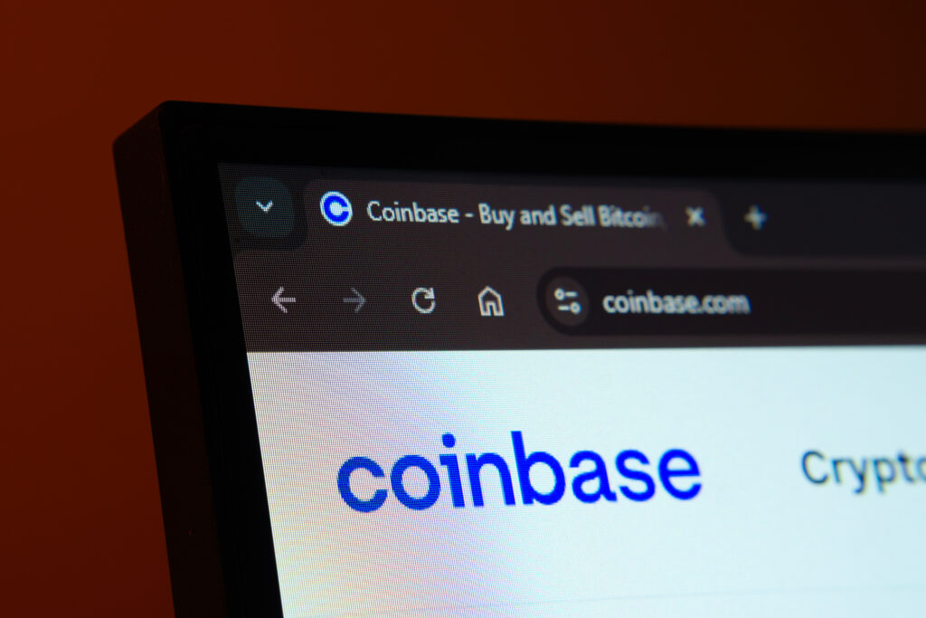 Close-up of a computer screen displaying the coinbase web interface in dark mode