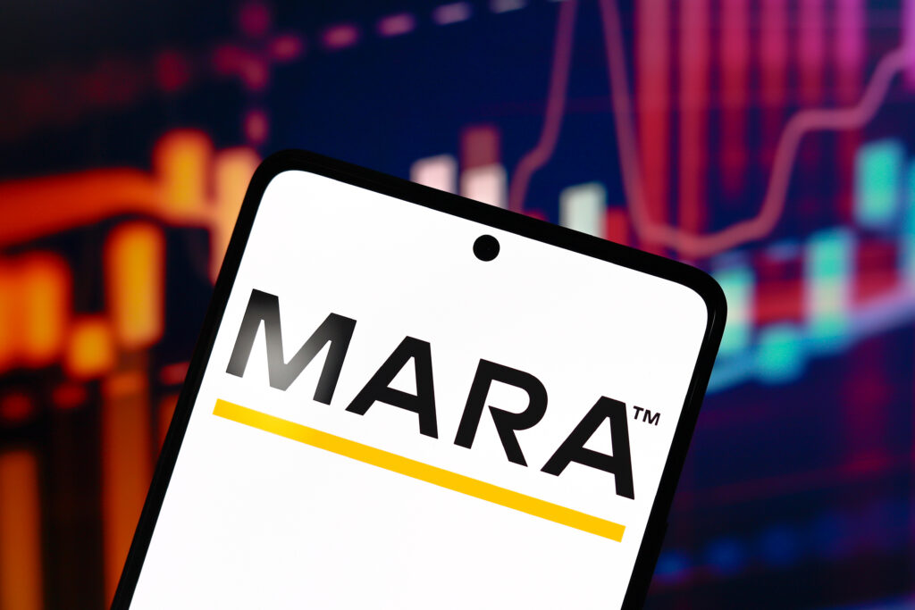 Marathon Digital Holdings (MARA) logo is displayed on a smartphone screen.