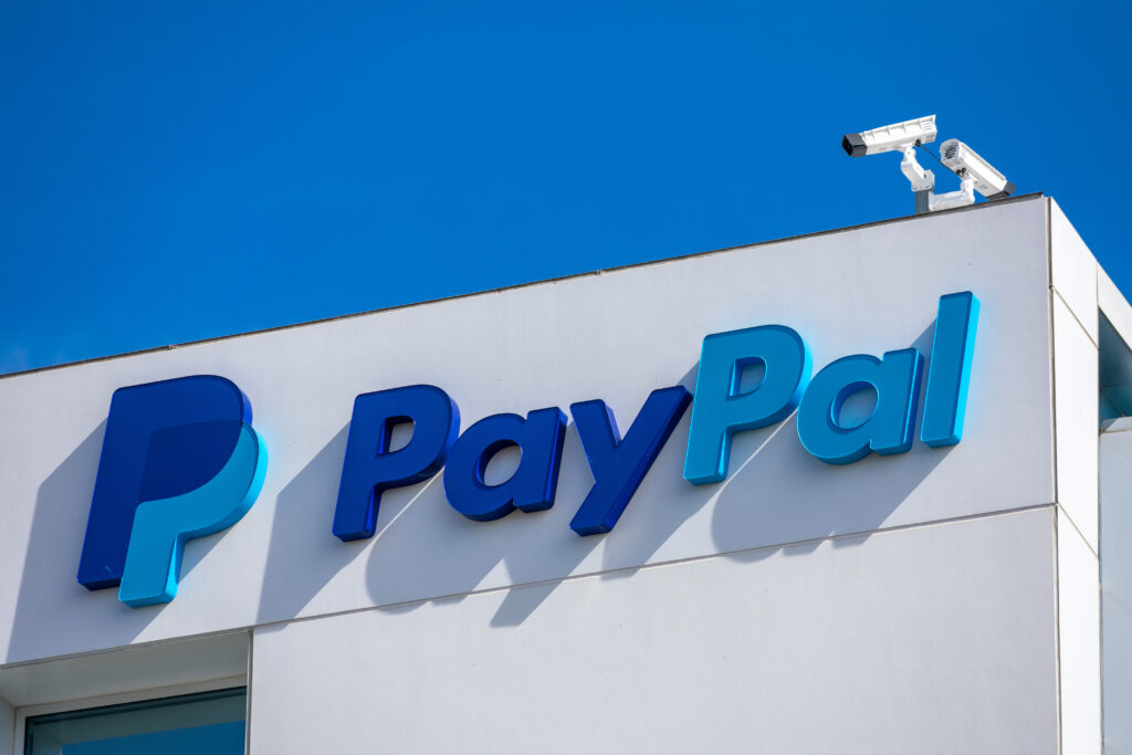 PayPal logo and sign at company headquarters building facade in Silicon Valley.