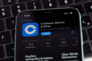 icon of the coinbase app on smartphone screen in Germany