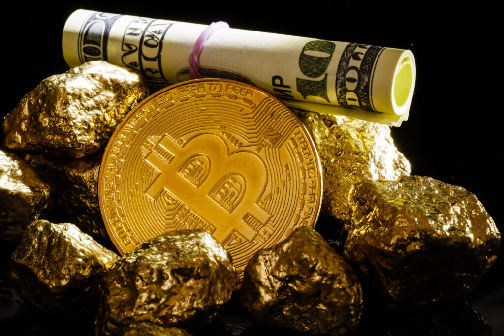 Nugget gold and dollar bills business concept bitcoin