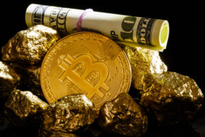 Nugget gold and dollar bills business concept bitcoin