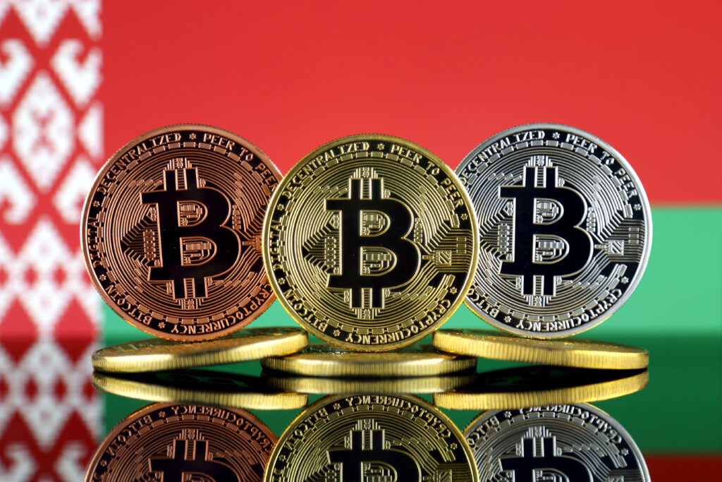 Physical version of Bitcoin (BTC) and Belarus Flag